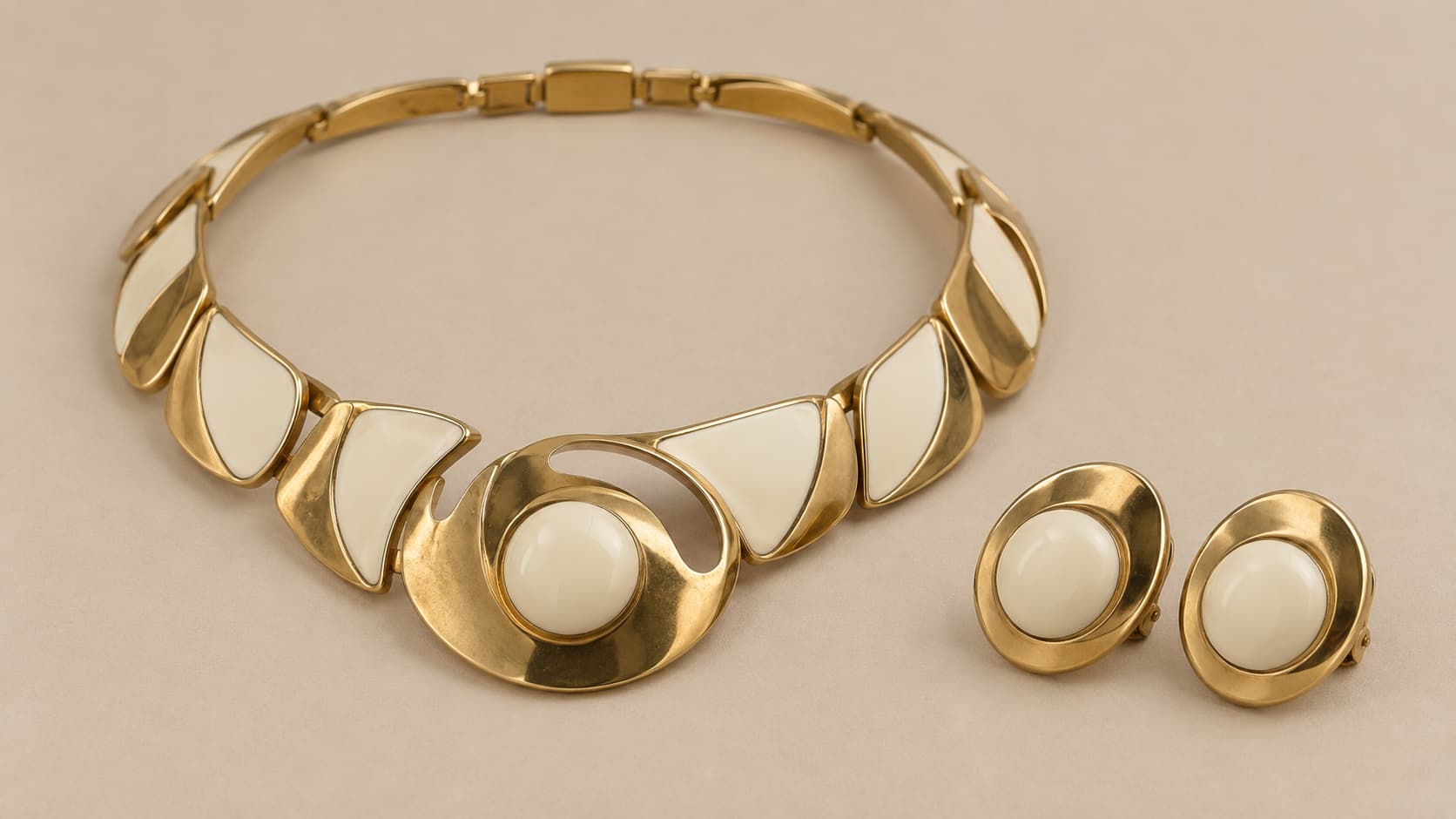 Gold and cream enamel geometric necklace and earring set from 1960s mod jewelry design