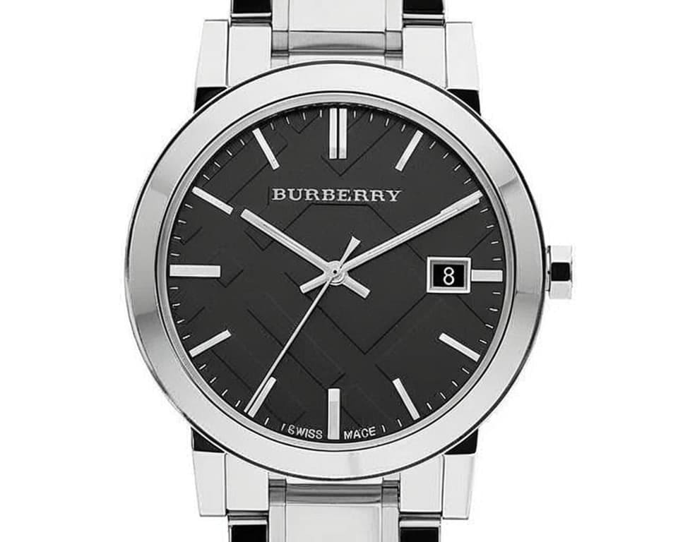 Burberry Heritage Collection watch with black dial featuring signature check pattern, stainless steel case and bracelet, Swiss Made marking visible