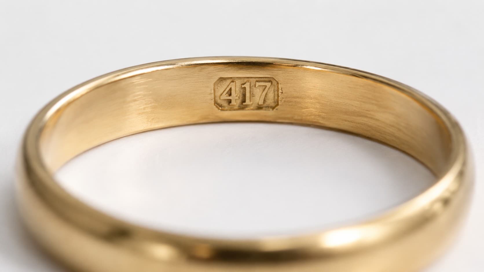 Close-up of a 417 stamp on a 10K gold ring