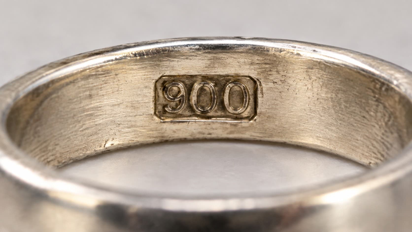 What Does an 900 Stamp Mean on Silver Jewelry?