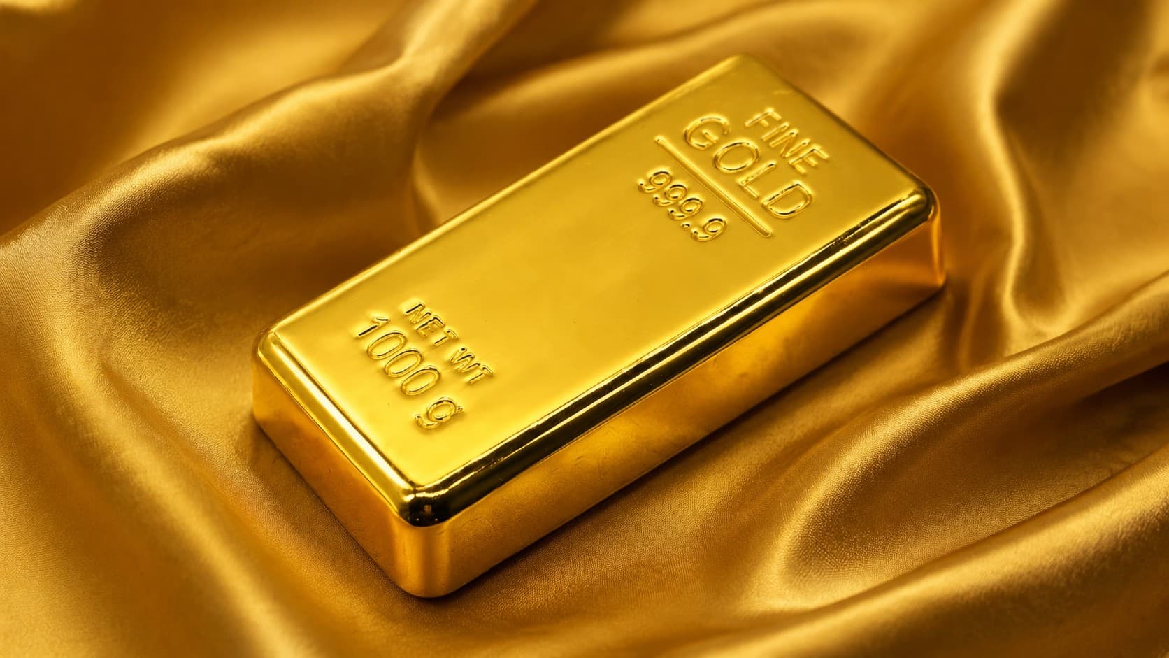 Fine gold bar stamped 999.9 with a net weight of 1000 grams