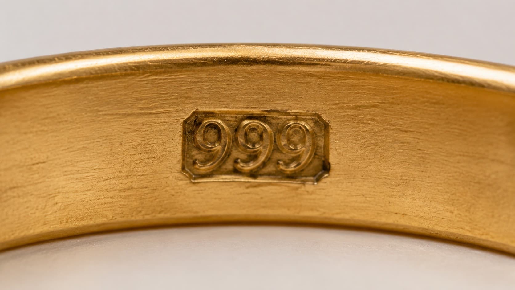 What Does 999 Stamp Mean on Jewelry - 24K Gold Guide