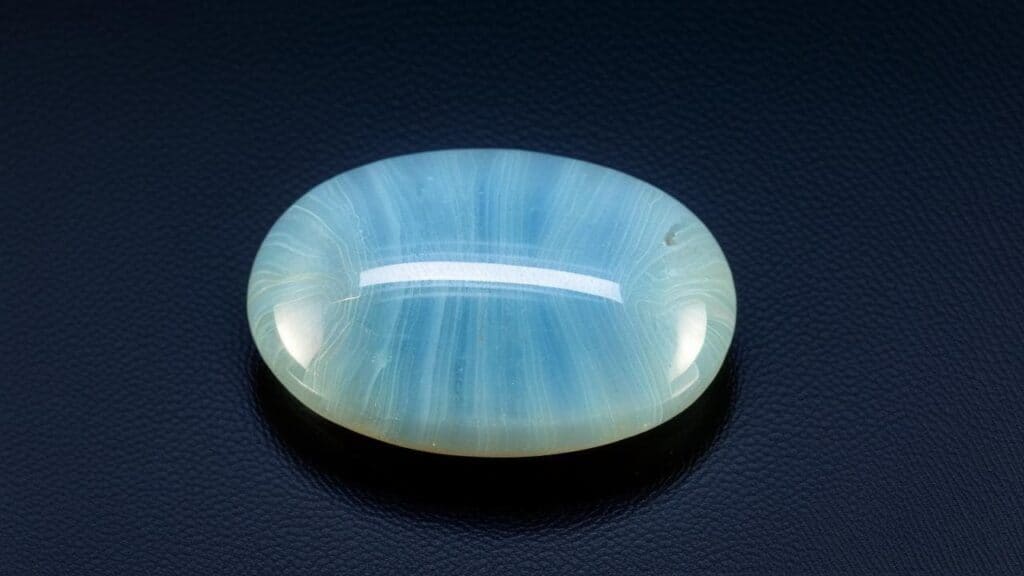 Sky blue barite cabochon showing smooth polished surface and characteristic color similar to specimens from Mexico and Brazil
