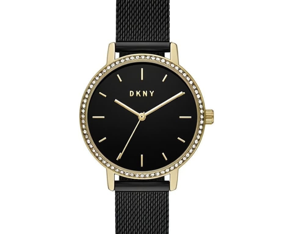 DKNY gold-tone watch with black dial, crystal-set bezel, and black mesh bracelet showing elegant fashion timepiece