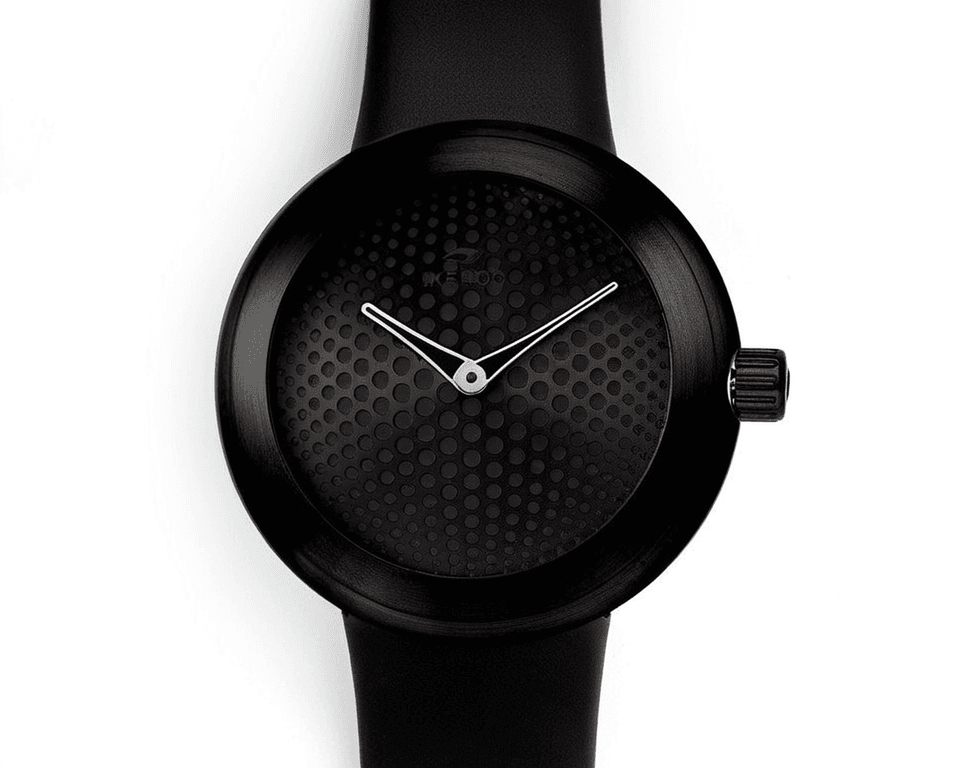 IKEPOD watch with honeycomb pattern dial and black monocoque case design