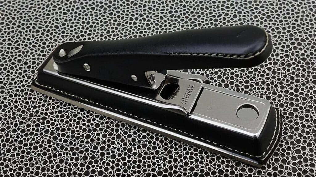 Professional leather hole punch tool with leather handle for resizing watch straps and creating new adjustment holes