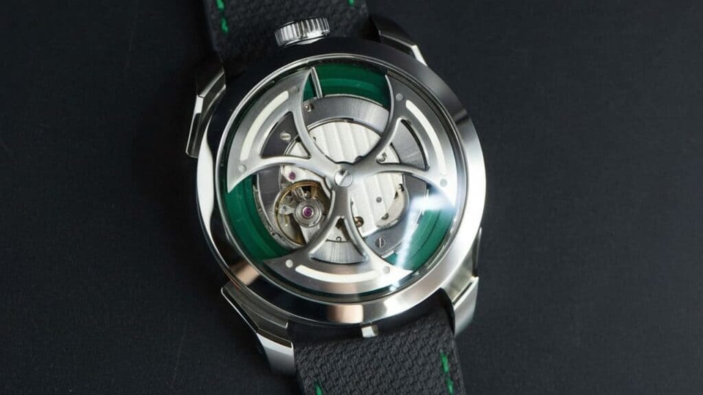 MB&F Legacy Machine timepiece with green accents and visible movement architecture displaying avant-garde watchmaking design