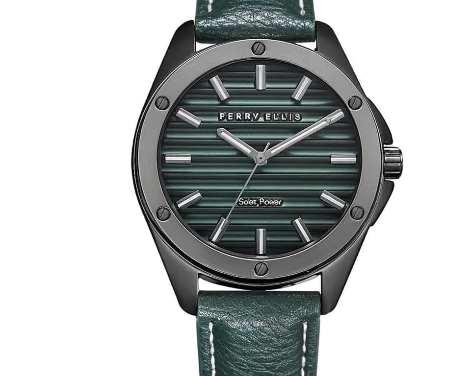 Perry Ellis solar power watch with textured green dial, gunmetal case and green leather strap