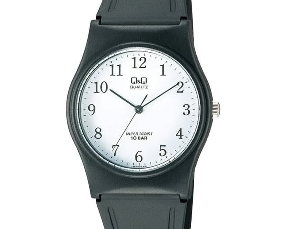 Q&Q casual watch with black resin case and strap featuring water resistant design perfect for everyday wear and active lifestyles