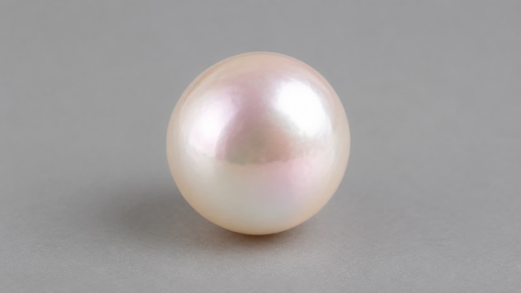 White and Cream Akoya pearl with a soft rosé sheen