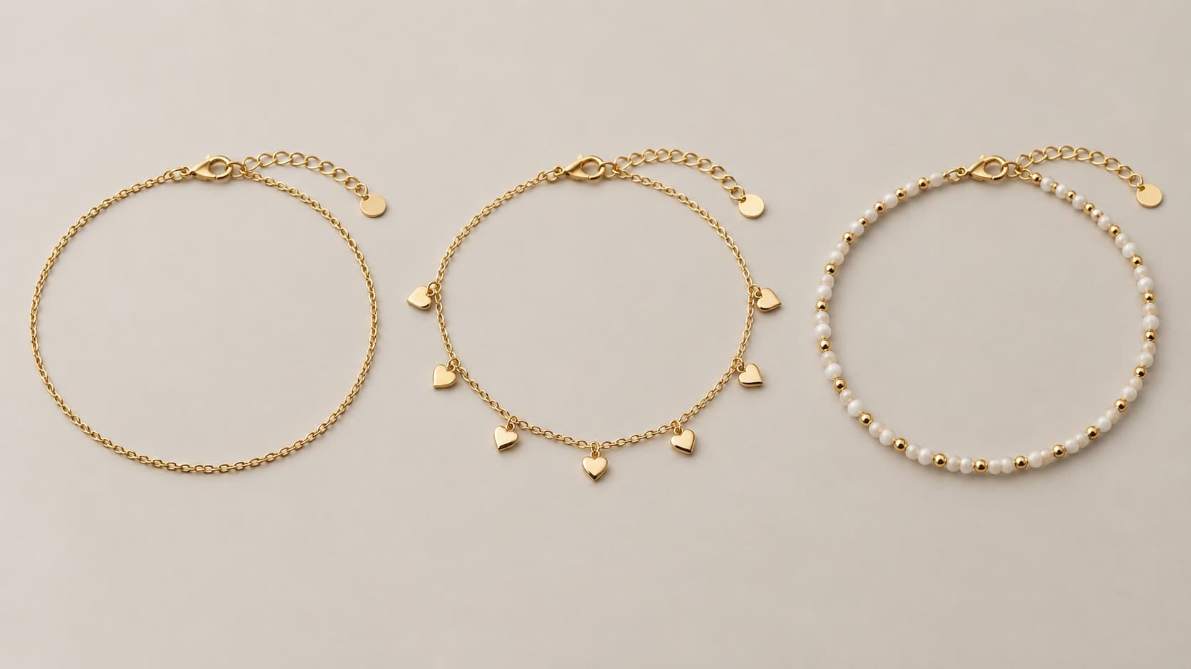 Three anklet types side by side: a plain gold chain anklet, a heart charm anklet, and a pearl bead anklet