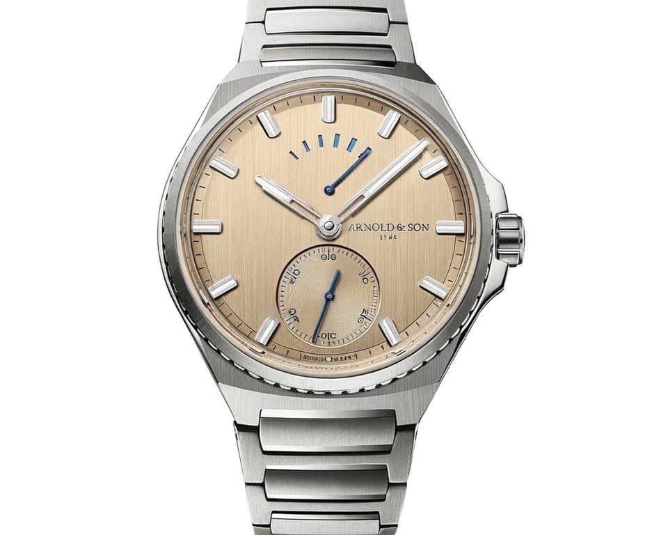 Arnold & Son HM Steel Amber watch with champagne textured dial, power reserve indicator, and stainless steel bracelet