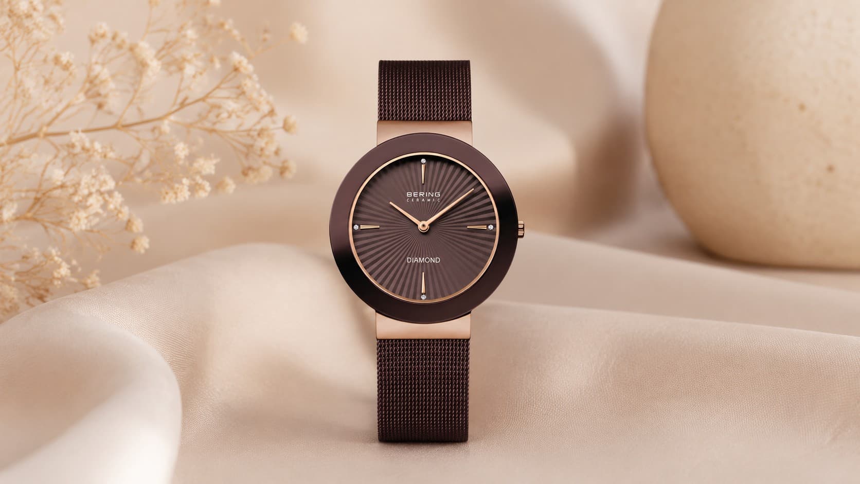 Bering Ceramic watch in polished rose gold with brown ceramic dial and diamond markers