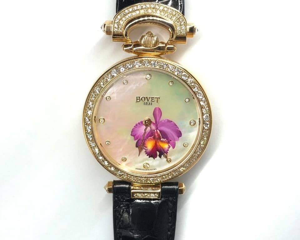 Bovet Fleurier gold watch with diamond bezel and painted orchid on mother-of-pearl dial