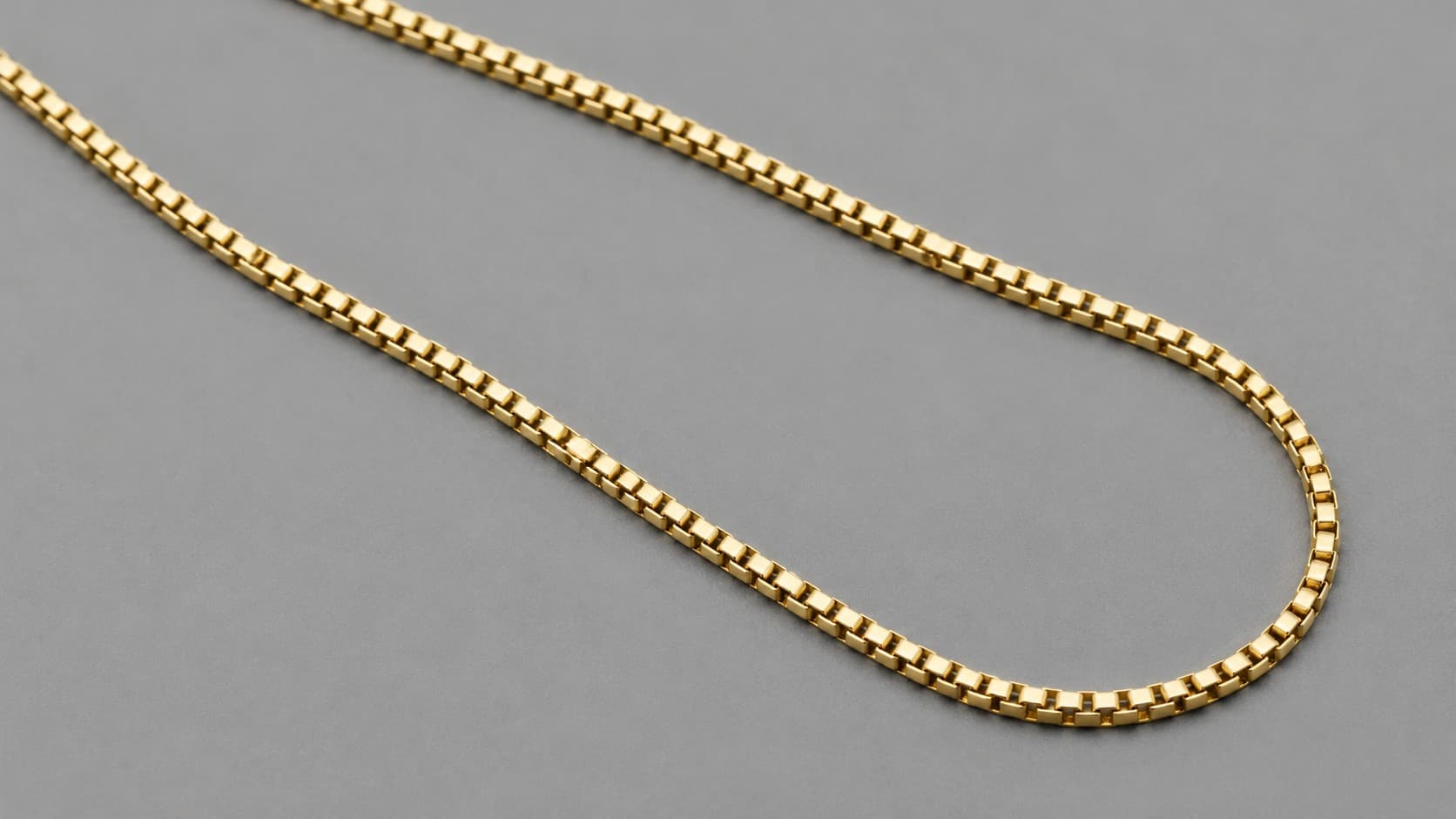 Gold box chain necklace with square interlocking links