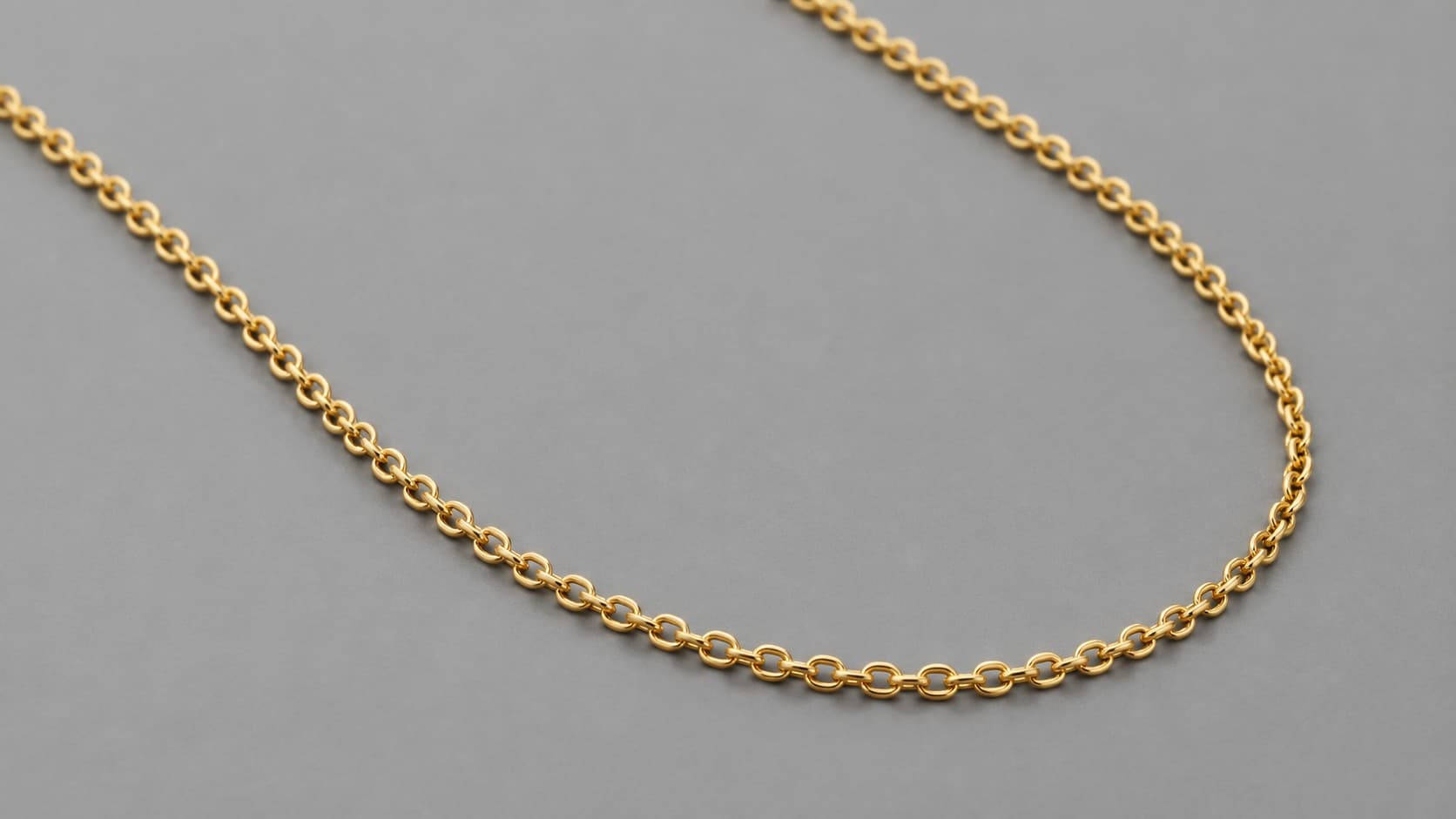 Gold cable chain necklace with simple round interlocking links