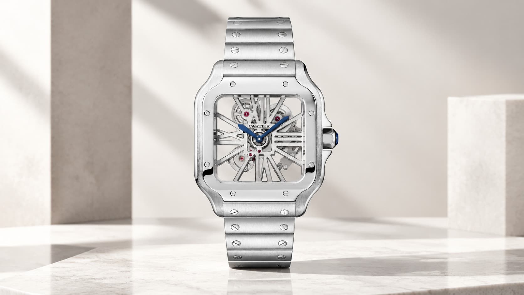 Cartier Santos de Cartier skeleton watch with Roman numeral bridges on a steel bracelet