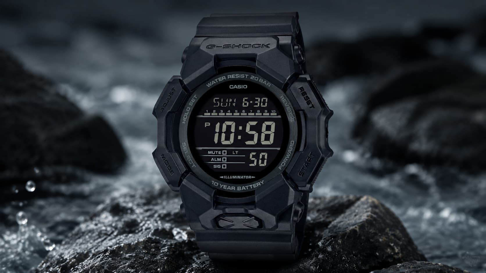 Casio G-Shock GD-010-1A1ER black digital watch with 20 bar water resistance and 10-year battery on wet rocks