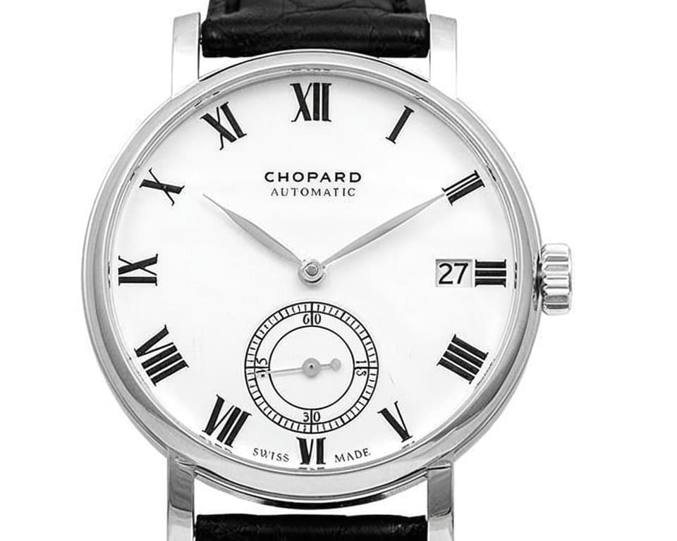 Chopard automatic watch in steel case with white dial, Roman numeral hour markers, date window, small seconds subdial, and black leather strap
