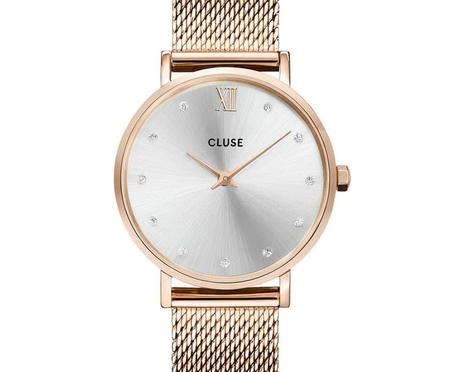Cluse watch featuring rose gold case with mesh bracelet and silver white dial with crystal markers demonstrating Dutch minimalist style