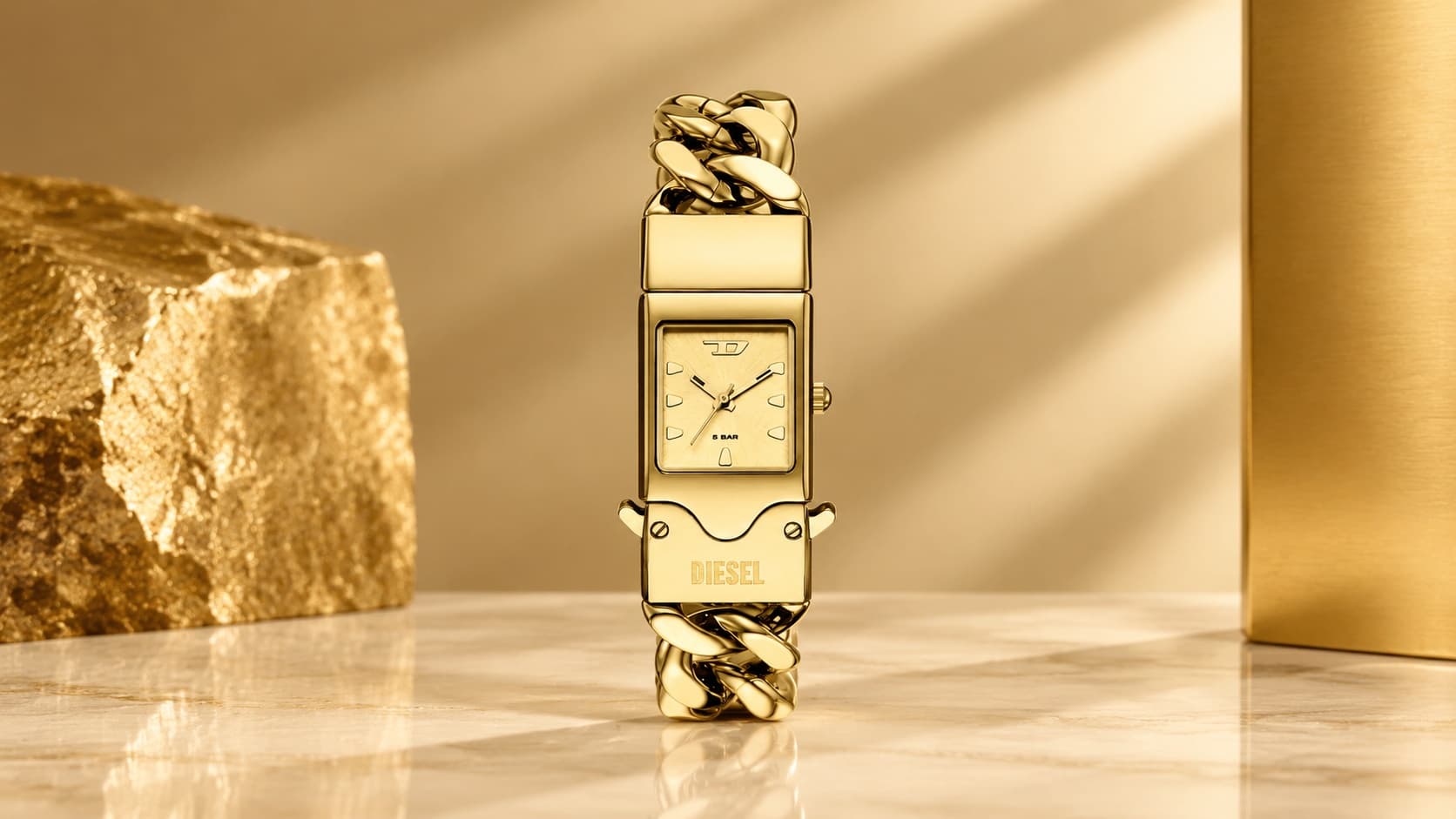 Diesel Closer gold-tone stainless steel watch with chain-link bracelet