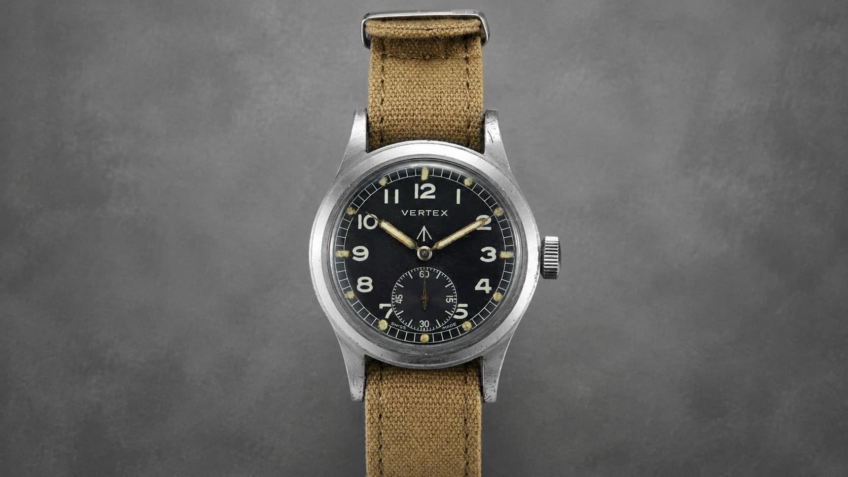 Vintage Vertex WWW military watch with black dial and khaki strap