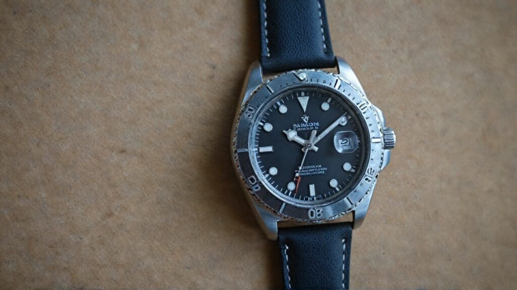 Professional dive watch with leather strap demonstrating temperature resistant watch features