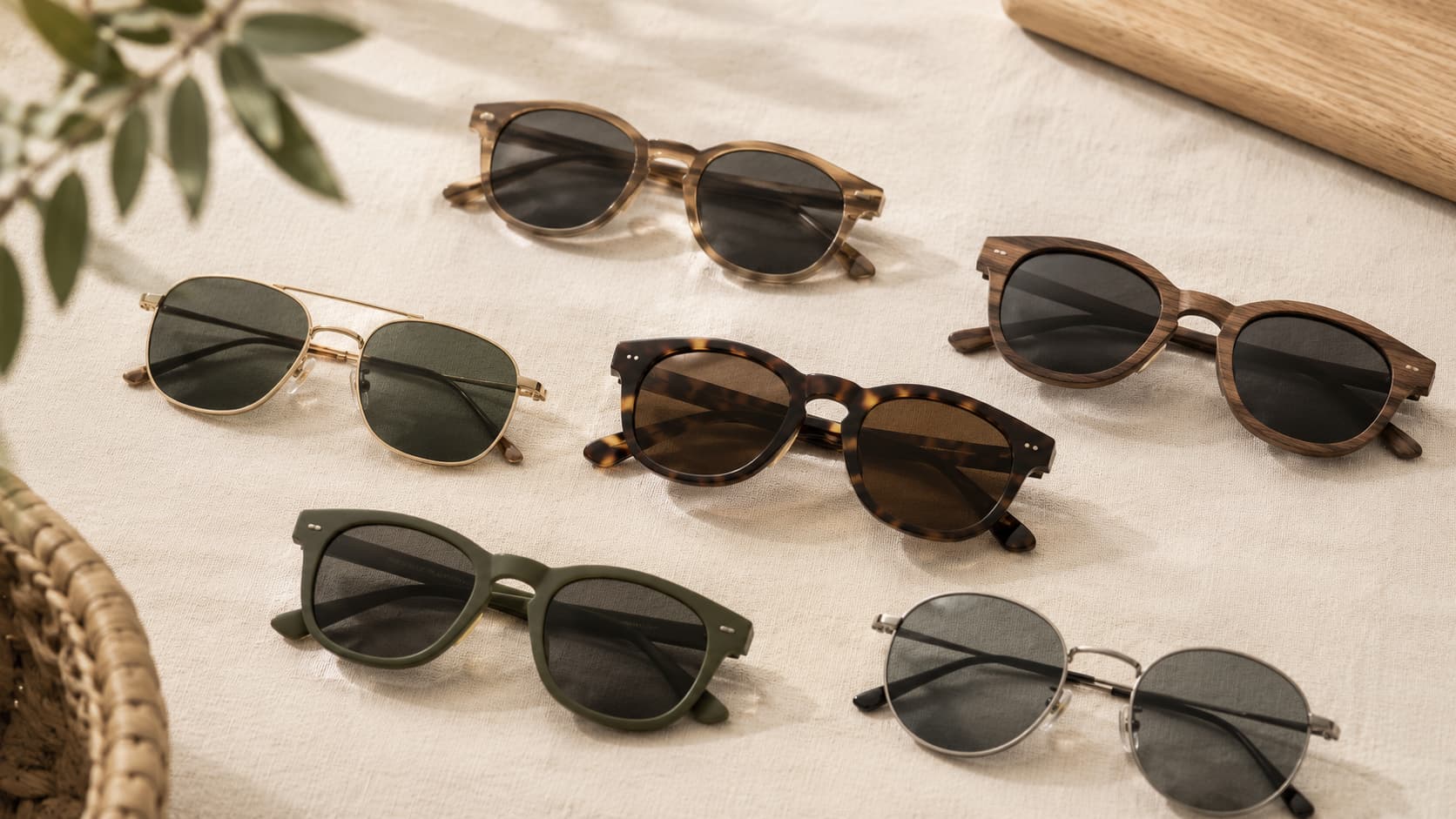 Collection of eco-friendly sunglasses frames made from wood, tortoise bio-acetate, and metal