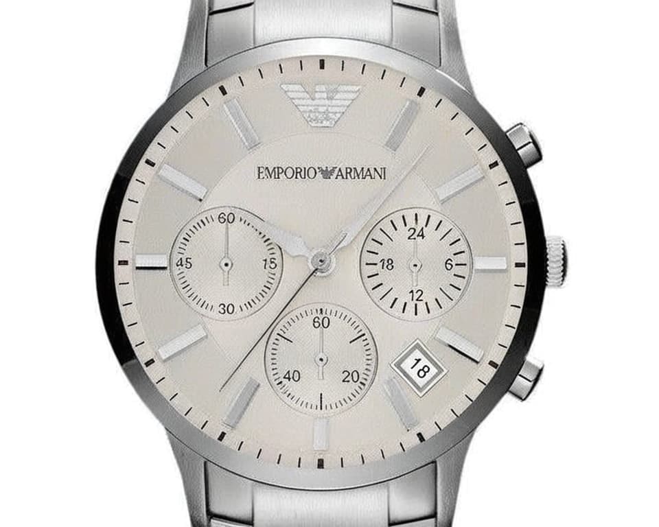 Emporio Armani silver chronograph watch with three subdials and date display on stainless steel bracelet showing Italian craftsmanship