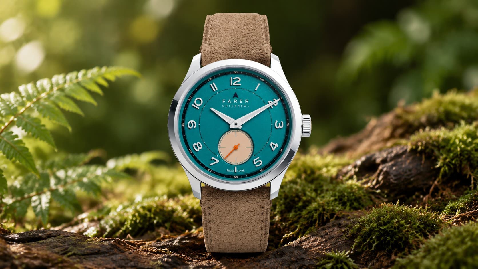 Farer Forrest Lissom watch with a teal dial and tan suede strap in a forest setting