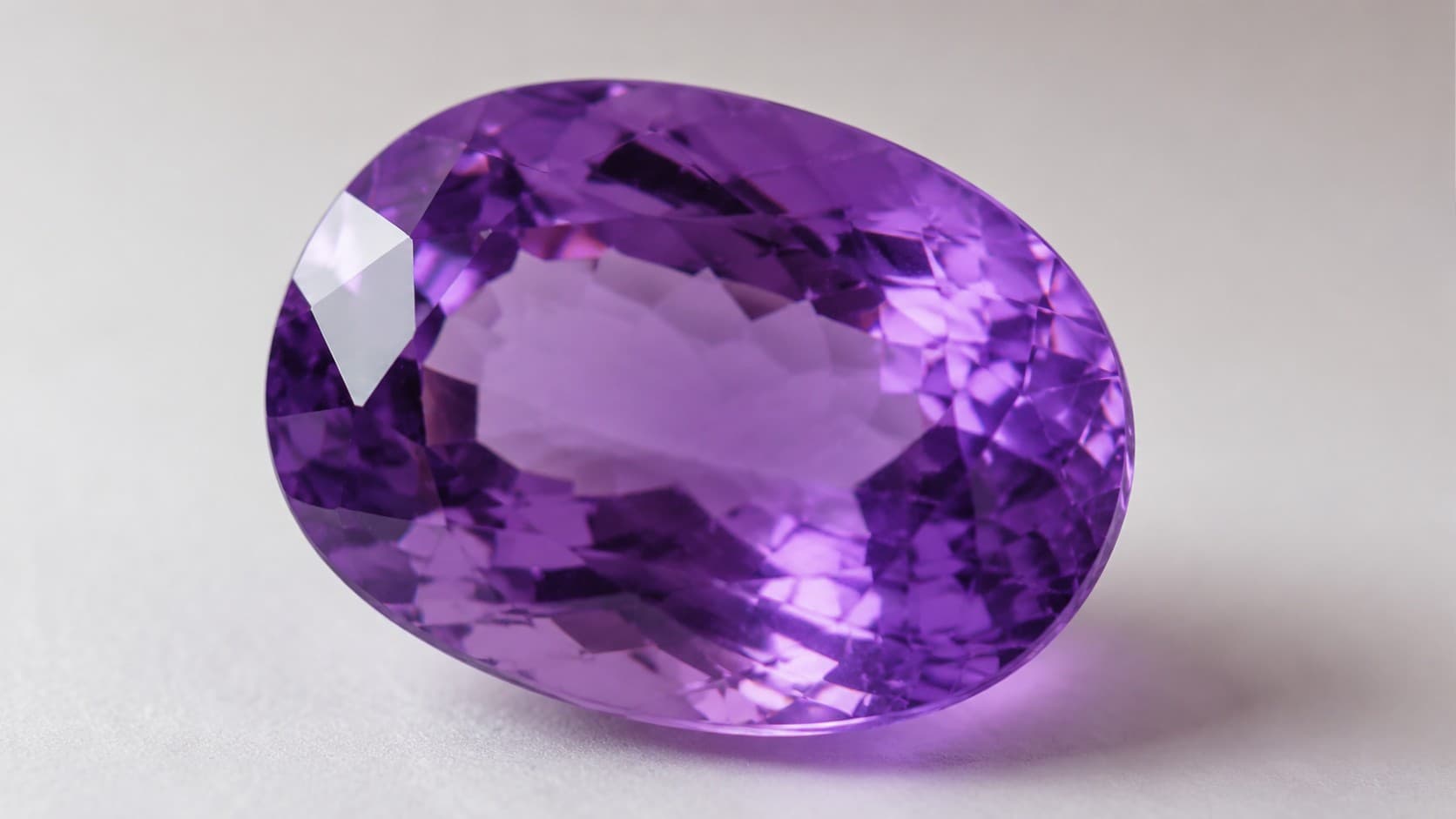 Oval-cut purple amethyst gemstone, the February birthstone