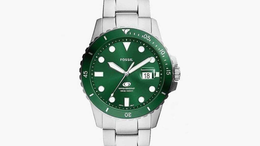 Fossil dive-inspired watch featuring green rotating bezel, luminous markers, and stainless steel bracelet with 100m water resistance