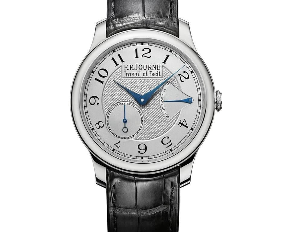 F.P. Journe Chronometre Souverain platinum watch with silver guilloche dial and blue hands showing power reserve indicator