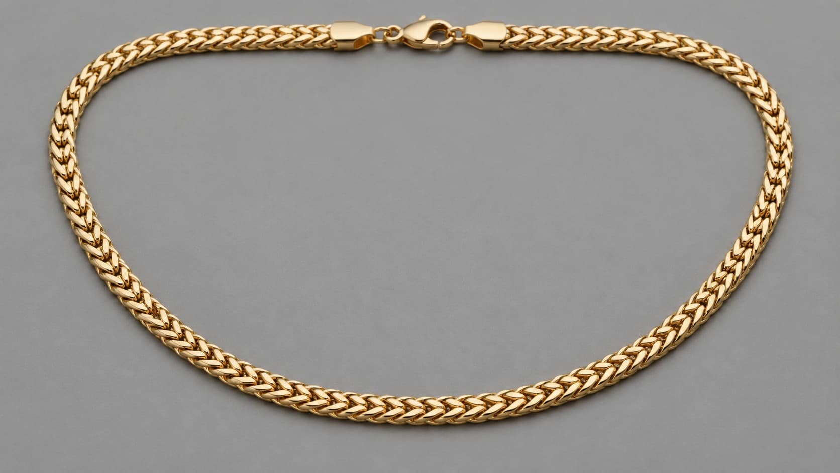Gold Franco chain necklace with tightly woven V-shaped links
