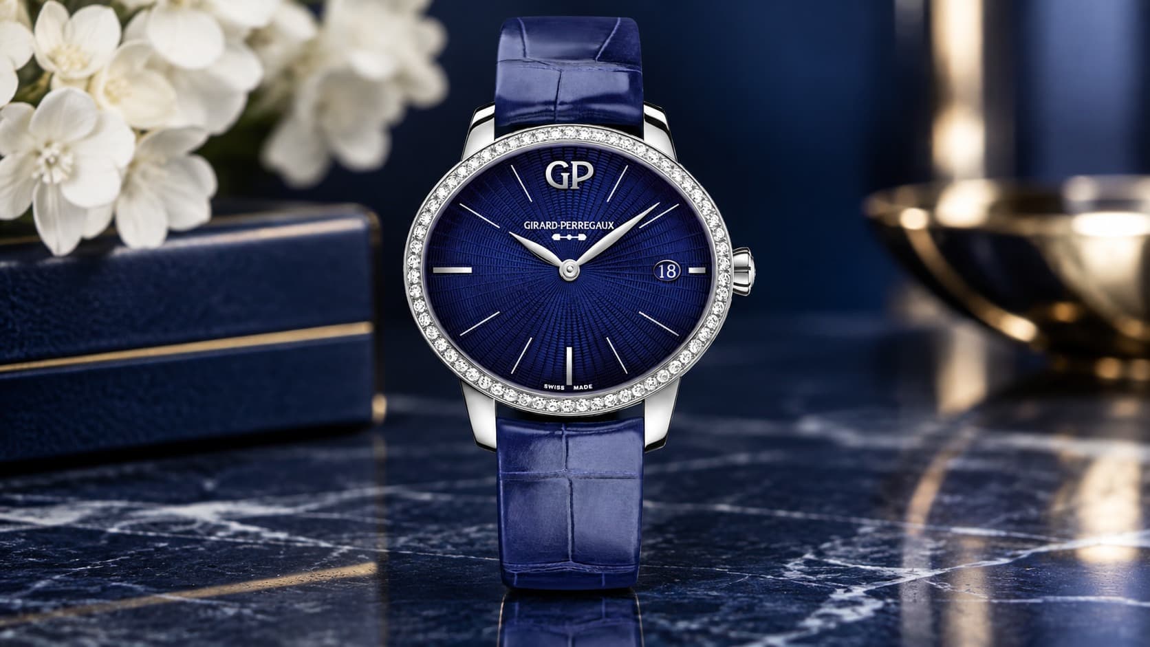 Girard-Perregaux Cat's Eye Eternity Edition watch with diamond bezel and blue alligator strap