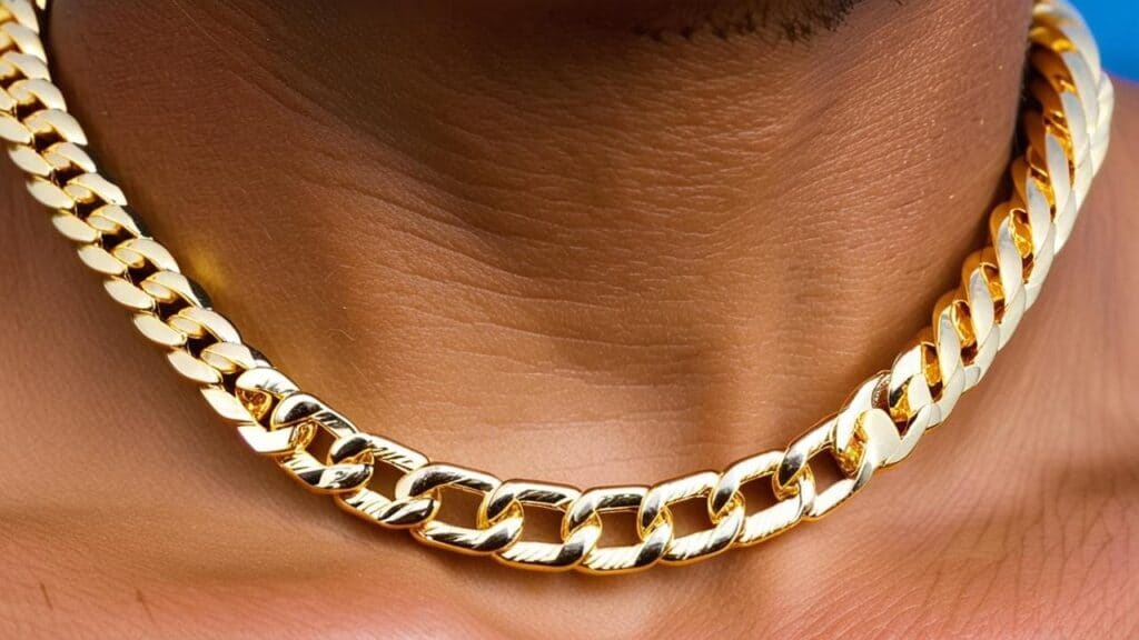 Gold Cuban chain worn around the neck showcasing bold streetwear jewelry style