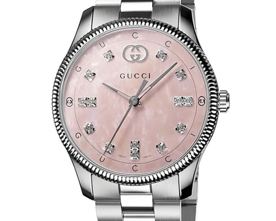 Gucci G-Timeless with pink mother-of-pearl dial, diamond markers and fluted bezel