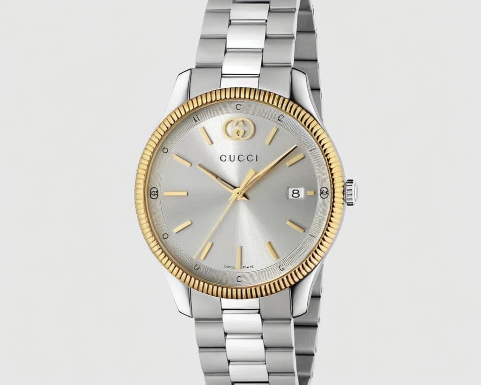 Gucci G-Timeless watch featuring two-tone stainless steel and yellow gold bezel, silver sunburst dial with date window at 3 o'clock