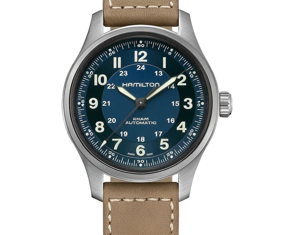 Hamilton Khaki Field automatic watch with blue dial, 24-hour markings, large Arabic numerals, and brown leather strap showing military inspired design