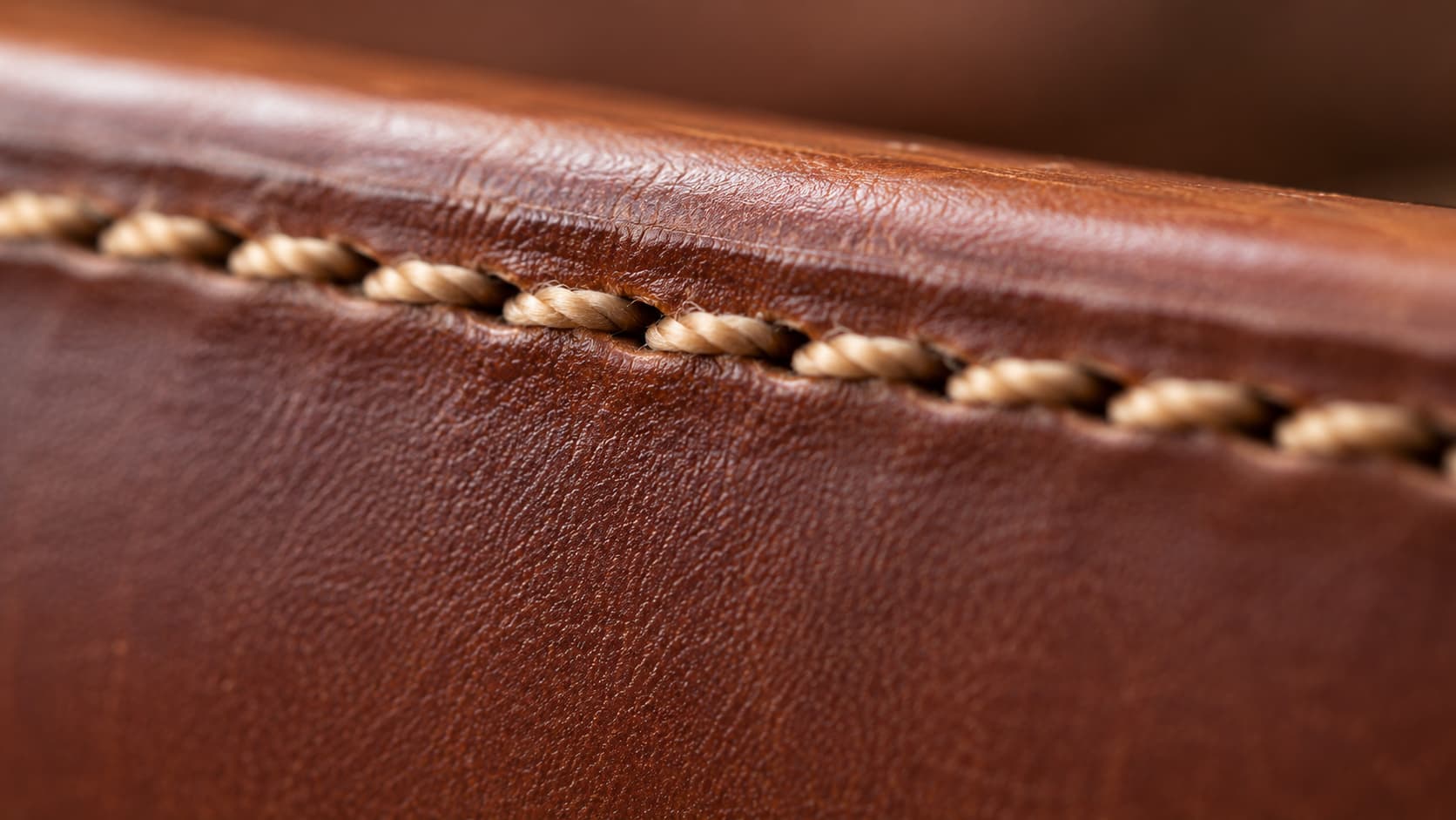 Close-up of diagonal saddle stitch pattern on leather