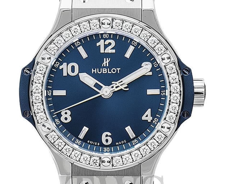 Hublot-style luxury watch with diamond-set bezel and blue dial showcasing Swiss watchmaking excellence