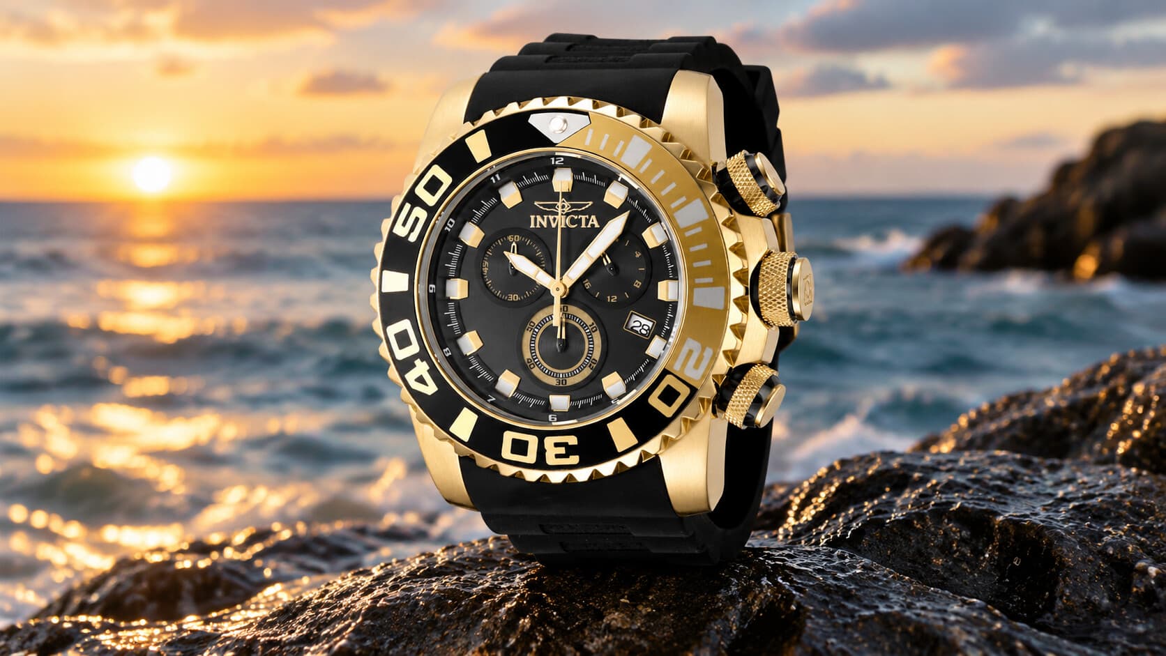 Invicta Sea Hunter 48988 gold and black chronograph watch on rocks at sunset