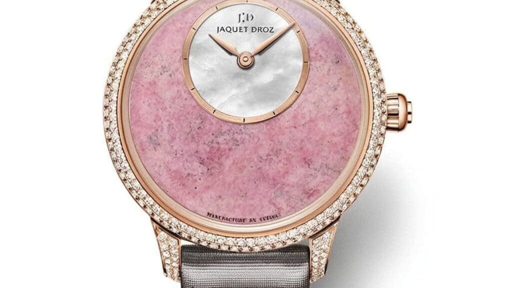 Jaquet Droz luxury watch featuring pink stone dial with diamond-set rose gold case and leather strap showcasing Swiss craftsmanship