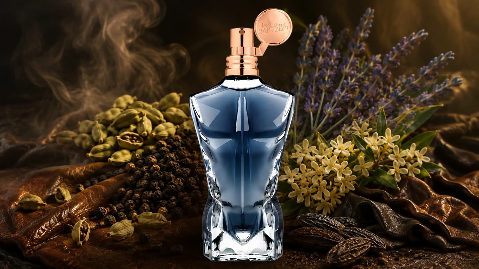 Jean Paul Gaultier Le Male Essence de Parfum bottle with cardamom, leather, and osmanthus
