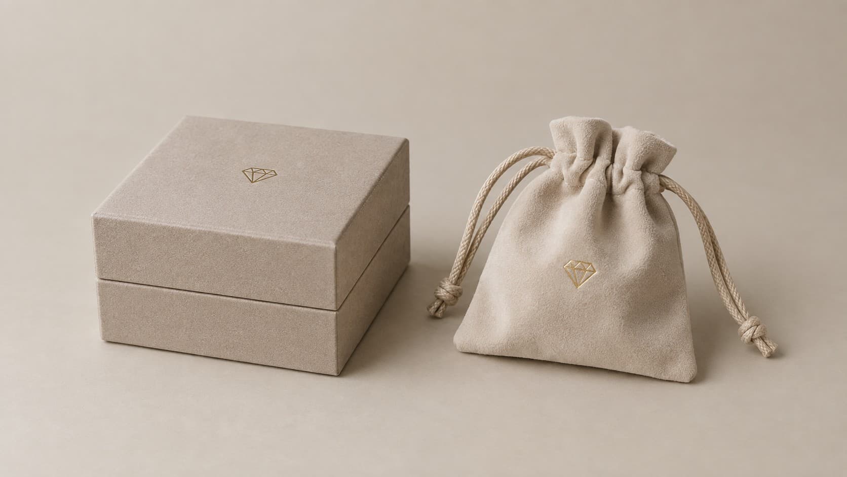 Beige suede jewelry box and matching drawstring pouch for jewelry storage