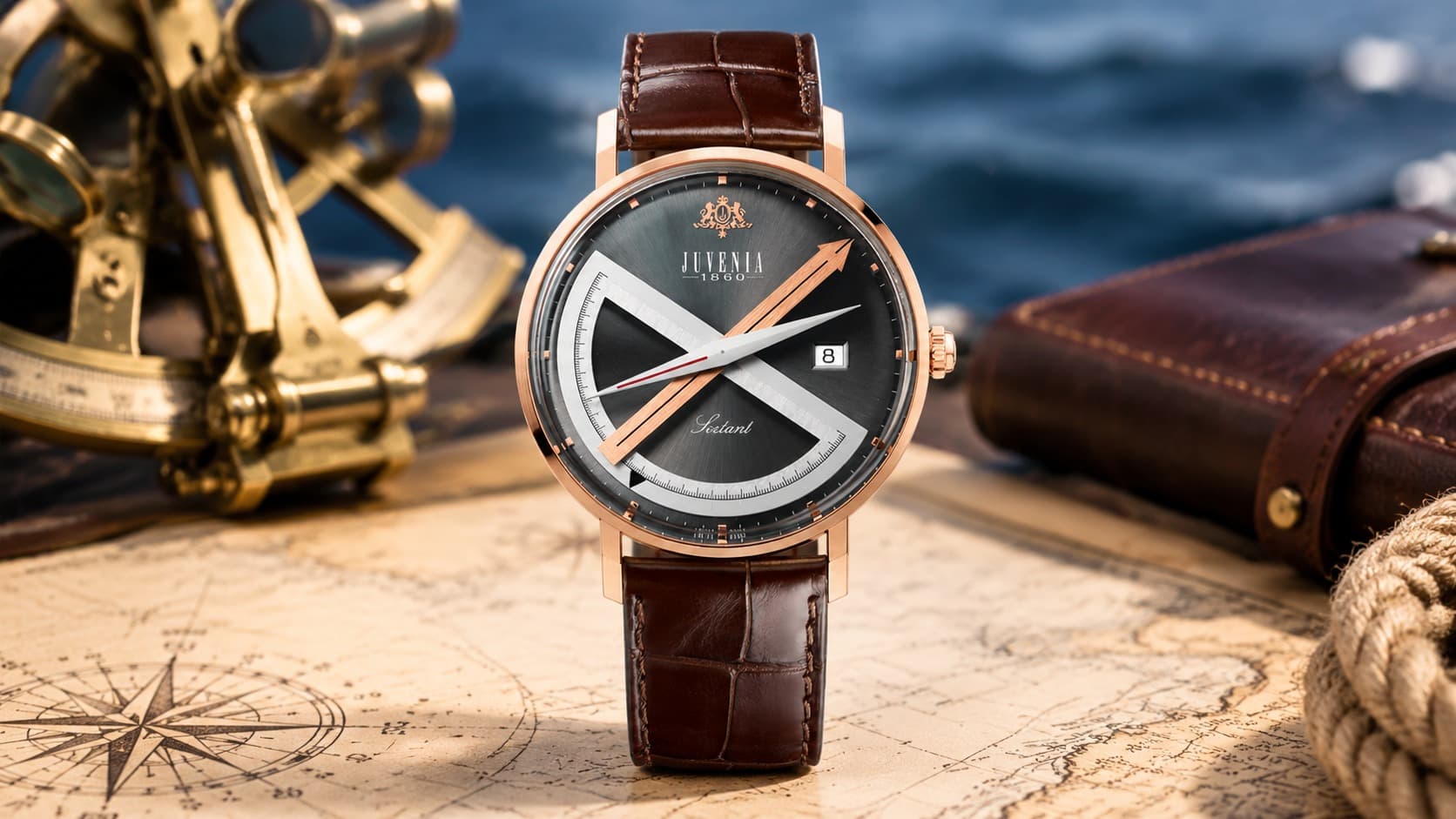 Juvenia Sextant III rose gold watch with brown leather strap and nautical sextant background
