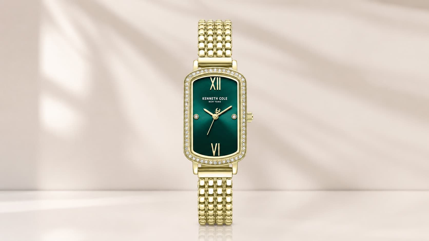 Kenneth Cole New York classic bracelet watch with a green dial and gold-tone case