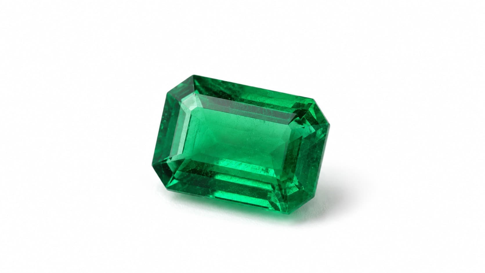 Loose emerald gemstone representing May's birthstone