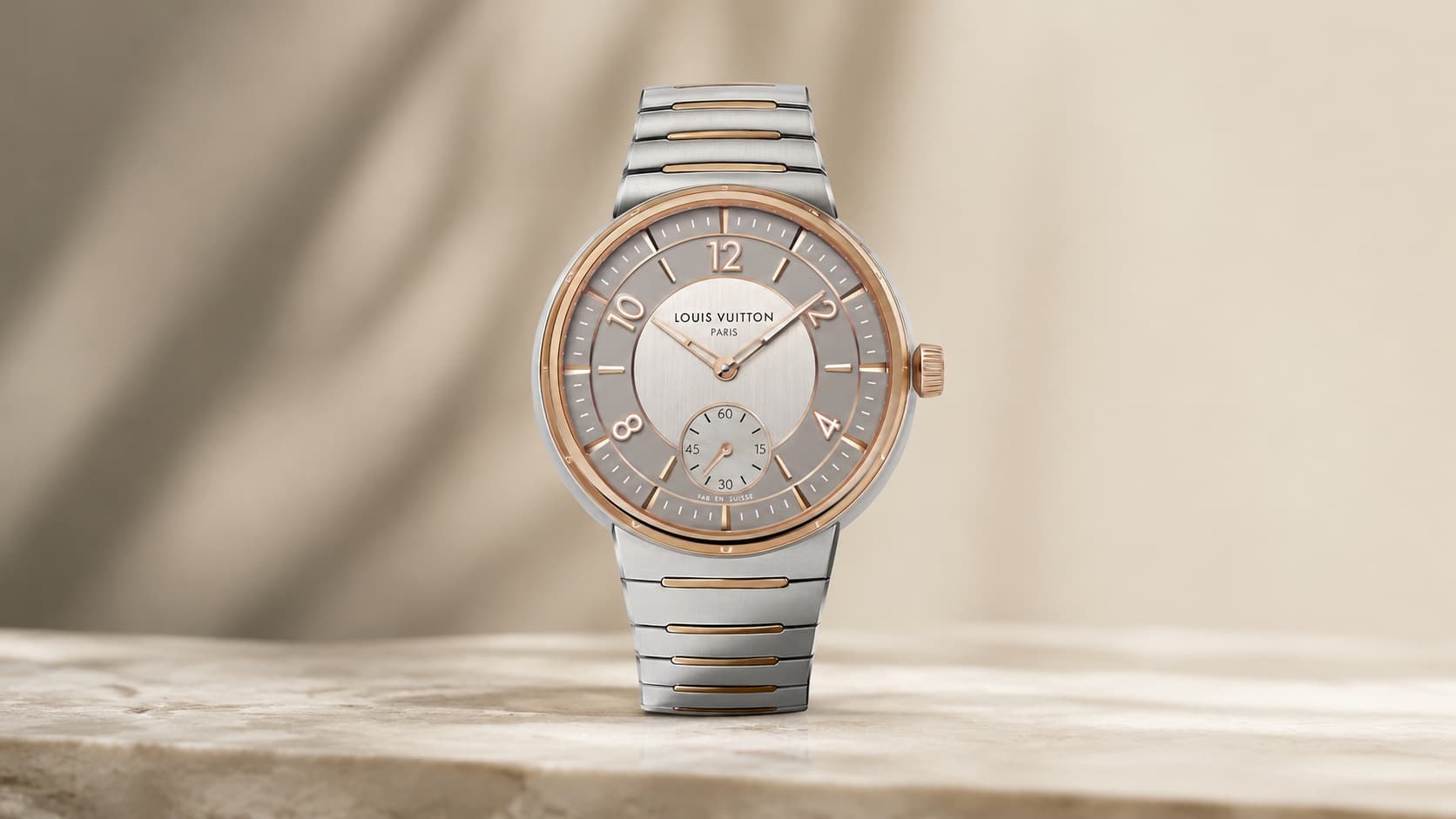 Louis Vuitton Tambour automatic watch in steel and rose gold with a round dial and integrated bracelet