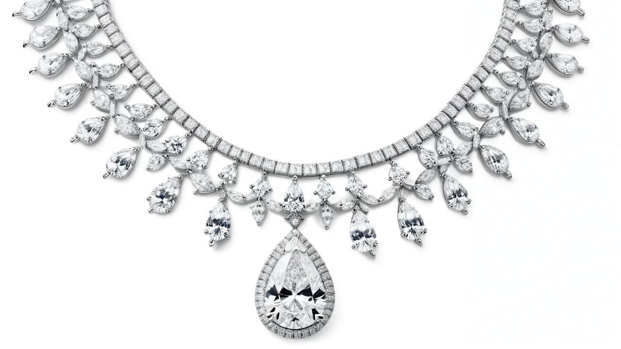 Diamond fringe necklace with marquise and pear stones and a large pear drop